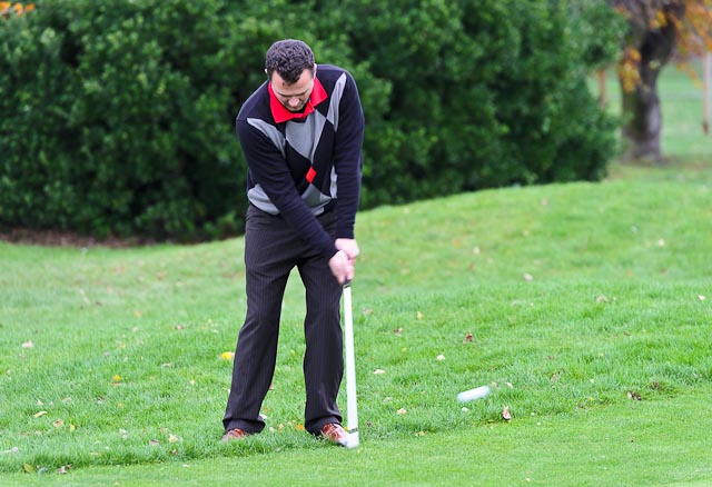 Keep the arms moving forward to prevent the hands flicking the club head